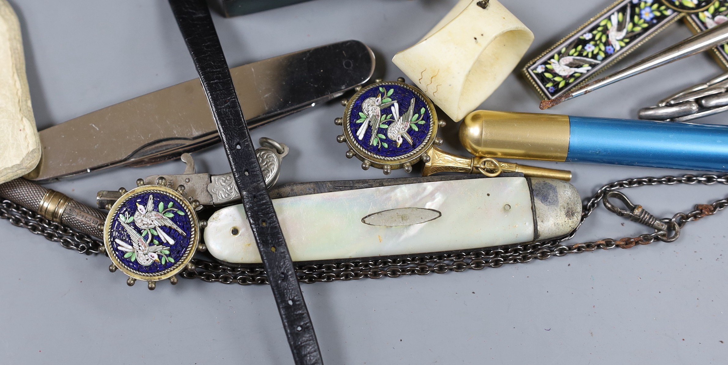 An early 20th century lady's 9ct gold wrist watch and sundry minor jewellery and accessories, including a German 950 white metal and enamel pill box.
